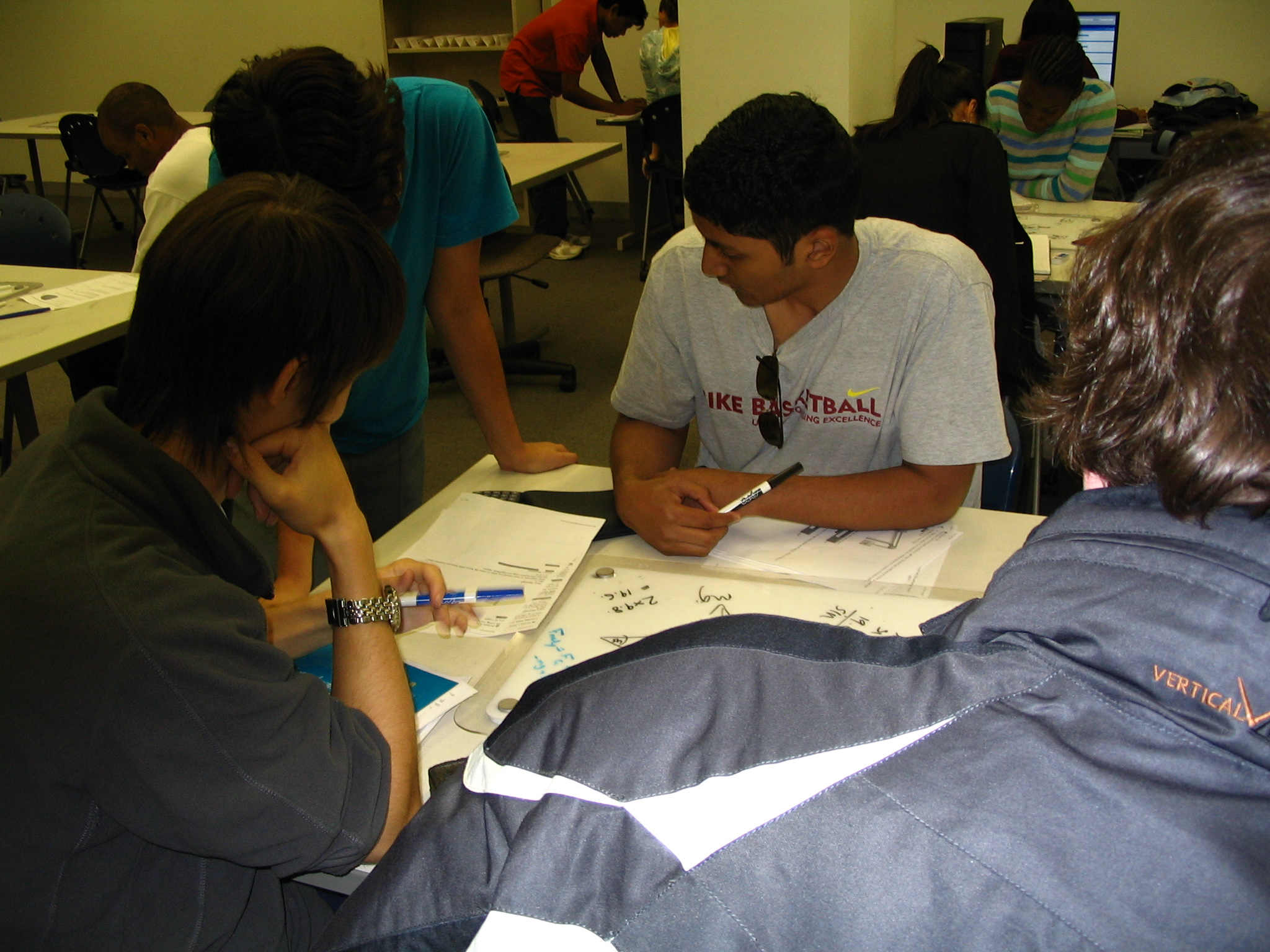 Students obtaining help in the Undergraduate Physics Tutorial Center.